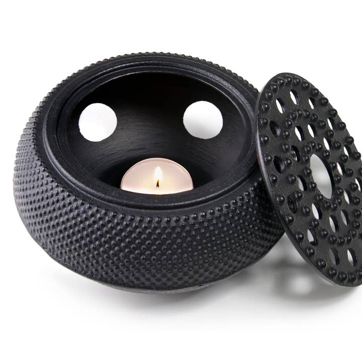 Cast iron teapot warmer